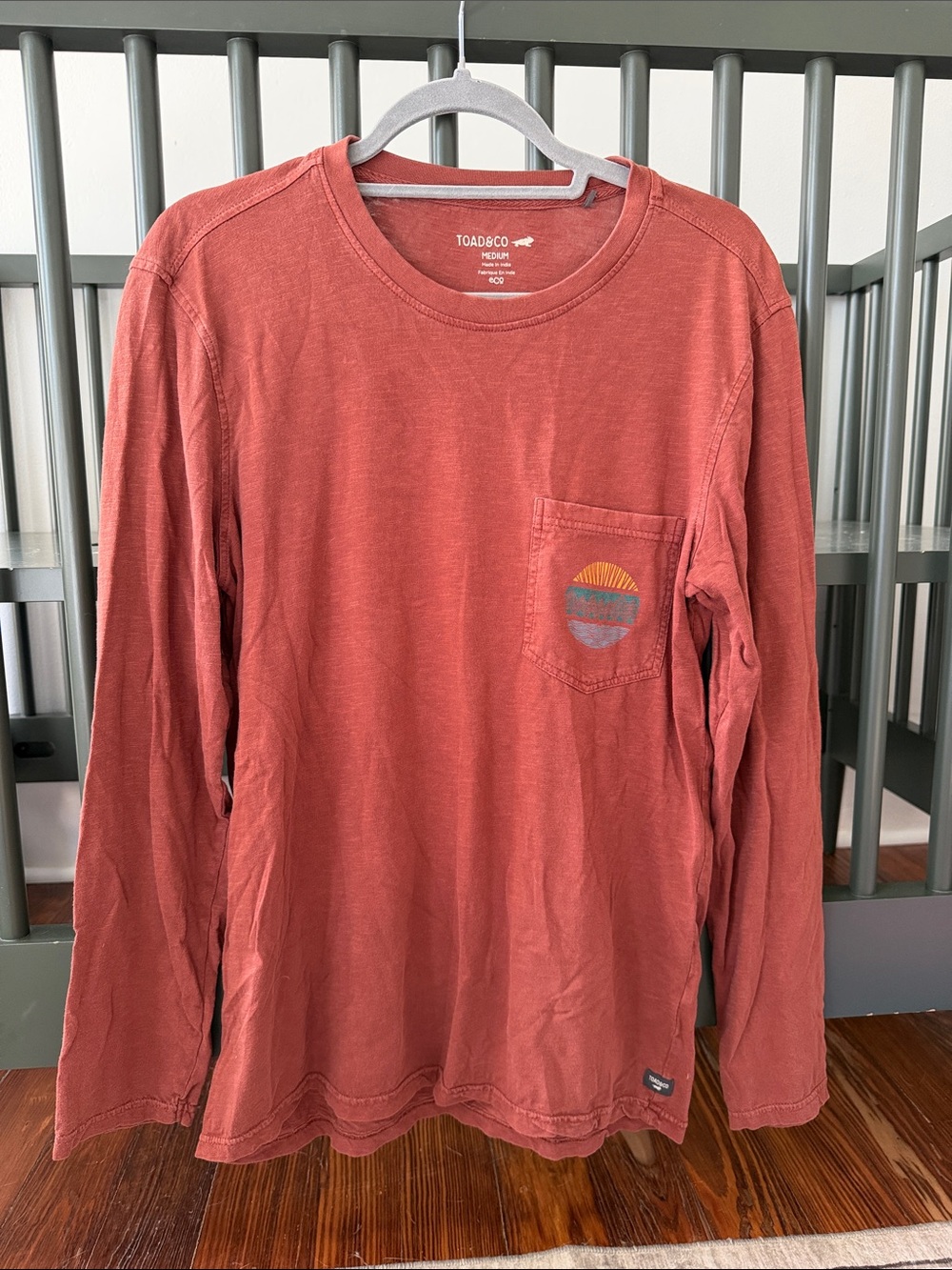 Toad&Co Men's Long-Sleeve Pocket Tee - Rust Red with Sunset Graphic